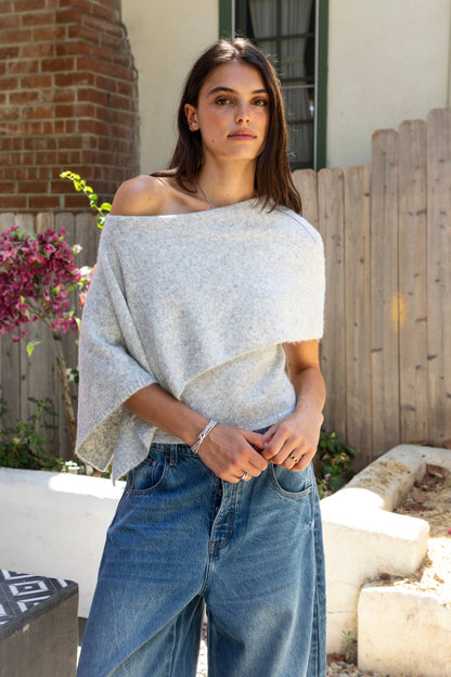 AINSLEY Off Shoulder Asymmetric Knit Poncho Sweater
