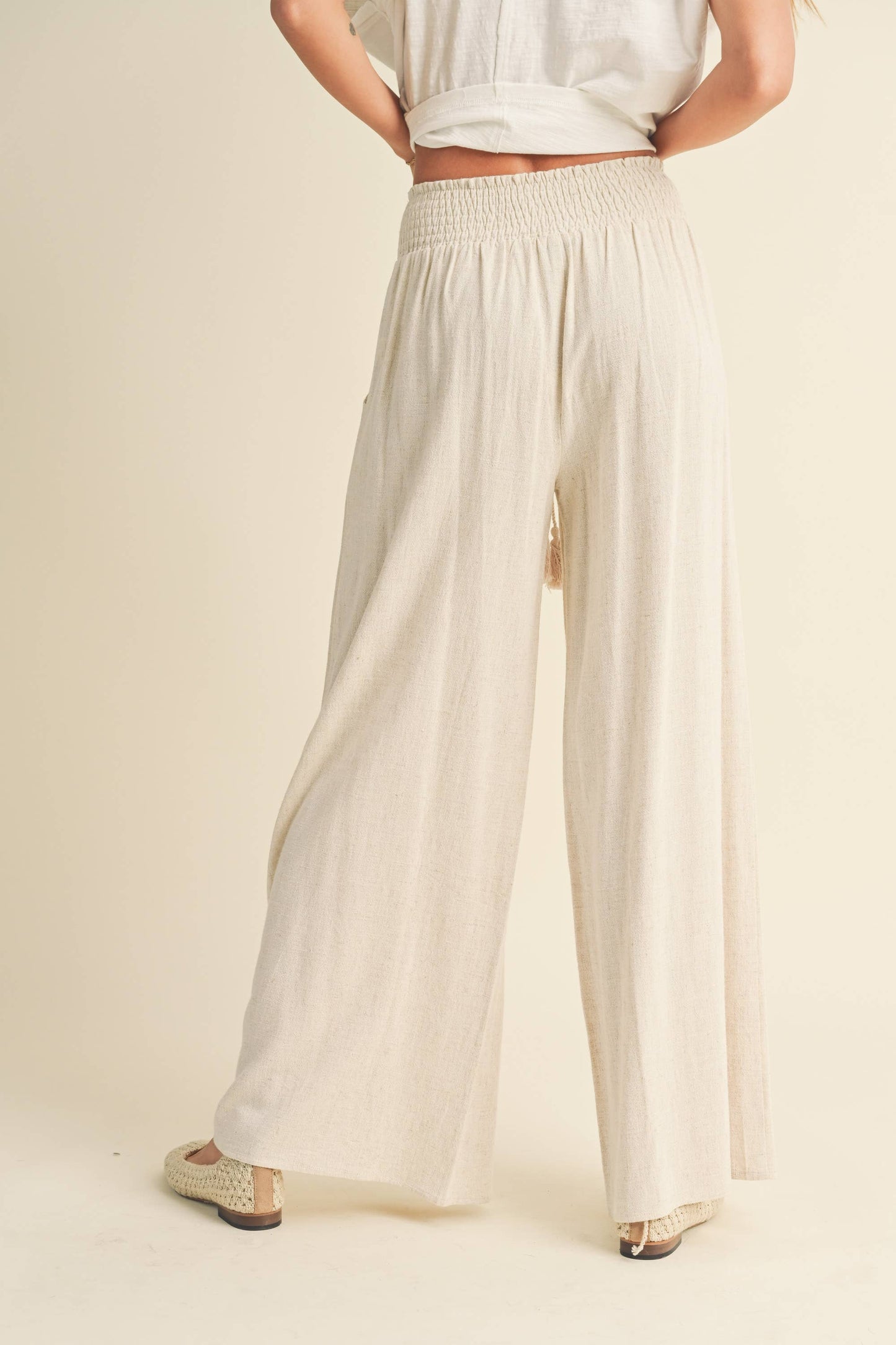 MMP469   COTTON LINEN SMOCKED WAIST PANTS WITH TASSEL