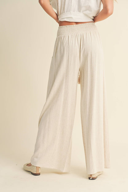 MMP469   COTTON LINEN SMOCKED WAIST PANTS WITH TASSEL