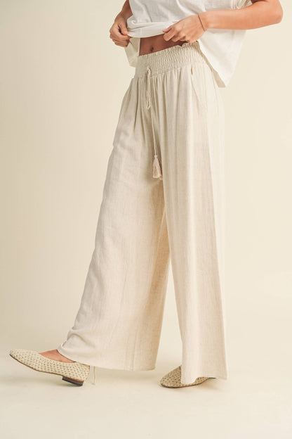MMP469   COTTON LINEN SMOCKED WAIST PANTS WITH TASSEL